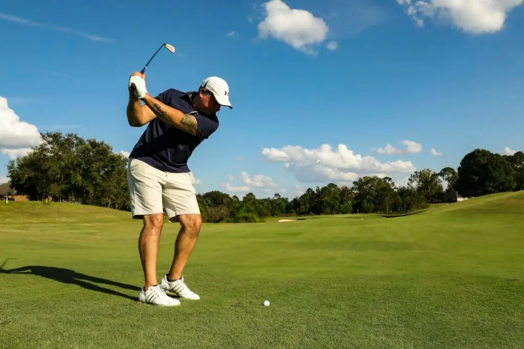 one arm golf swing